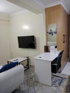 TV a/nebo společenská místnost v ubytování Relax Crib Kamakis + 24 fotografií