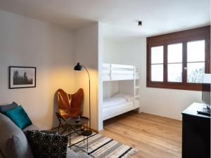 Un pat sau paturi într-o cameră la Apartment on Gerlitzen near Ski Lift