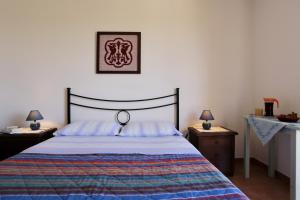 Letto o letti in una camera di Bed and breakfast Le Camelie