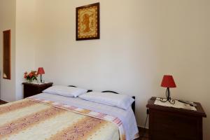 Letto o letti in una camera di Bed and breakfast Le Camelie
