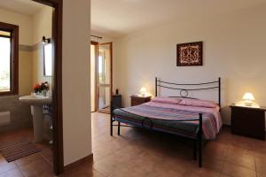 Letto o letti in una camera di Bed and breakfast Le Camelie