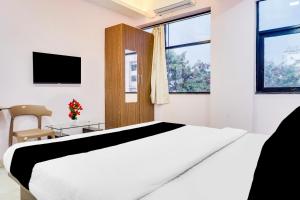 Postel nebo postele na pokoji v ubytování Super Collection O Chandan Nagar Kharadi formerly Kharadi INN