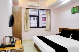 Postel nebo postele na pokoji v ubytování Super Collection O Chandan Nagar Kharadi formerly Kharadi INN