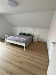 Postel nebo postele na pokoji v ubytování Apartma DUDI