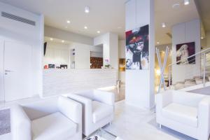 Kuchyň nebo kuchyňský kout v ubytování Hotel Carlton