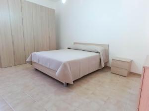 Ένα ή περισσότερα κρεβάτια σε δωμάτιο στο Casa Cavalè - Ai piedi della Montagna