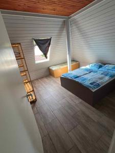 Posteľ alebo postele v izbe v ubytovaní Apartment Siofok, Somogy 10