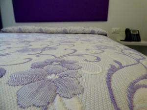 Letto o letti in una camera di Mon Repos