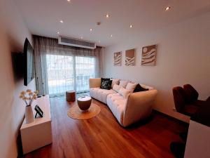 Μια τηλεόραση ή/και κέντρο ψυχαγωγίας στο Ferienappartements DeLux Keutschach am See