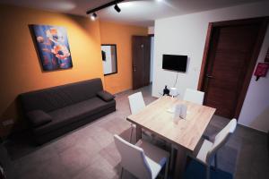Posezení v ubytování SkyLounge Suites