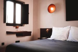Cama ou camas em um quarto em ananea Mykonos - Adults Only