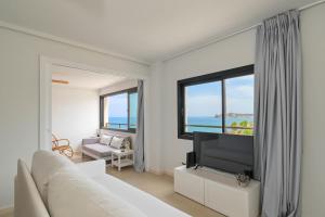 TV a/nebo společenská místnost v ubytování Bonita Stay B Sun Mega vistas, fibra, BBQ, AA