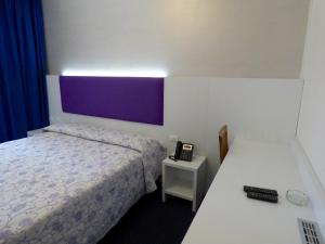 Letto o letti in una camera di Mon Repos