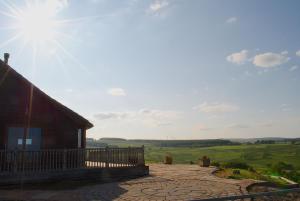 a house with a view of a green field at Auchenhill Lodge in Denny