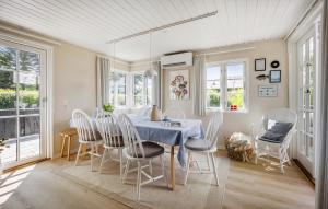 a dining room with a table and chairs at Nice Home In Haderslev With Wifi in Haderslev