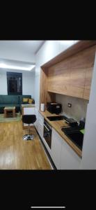 Η κουζίνα ή μικρή κουζίνα στο apartmanxslavica