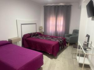 Afbeelding uit fotogalerij van San Pablo Rooms in Córdoba +14 foto's