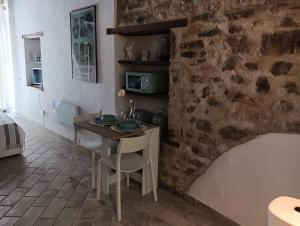 TV a/nebo společenská místnost v ubytování Cami Suite - monolocale a Spoleto
