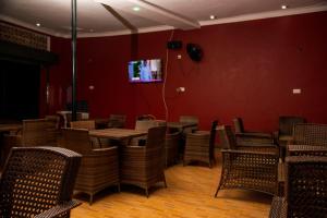 TV a/nebo společenská místnost v ubytování PK Sleek Suites