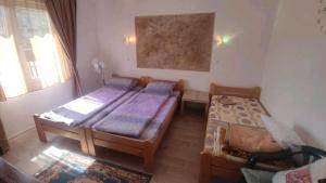 Letto o letti in una camera di Soba Soko