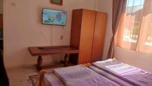Letto o letti in una camera di Soba Soko