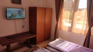 Letto o letti in una camera di Soba Soko