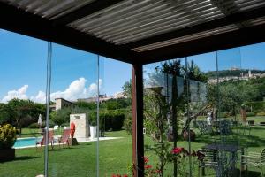 A garden outside Tenuta San Masseo - boutique farm resort & SPA