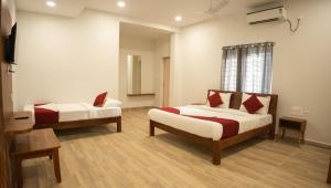 Postel nebo postele na pokoji v ubytování Hotel Sun Suites - A unit of SUN Group - Spacious Rooms - Brand New Building