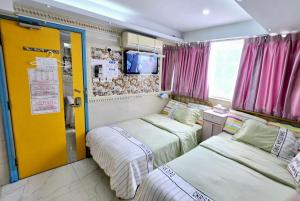 LongWin Hostel - Jordan MTR 객실 침대