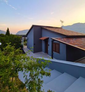 a house with a view of the mountains at Chalet Ponte Paradiso Suite & SPA in Santa Cristina Gela +32 photos