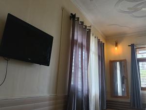 Μια τηλεόραση ή/και κέντρο ψυχαγωγίας στο Niharika Homestay