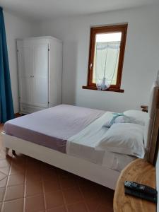 Posteľ alebo postele v izbe v ubytovaní Agriturismo Scialà