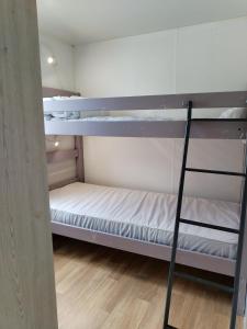 Postel nebo postele na pokoji v ubytování Mobil-home avec vue mer