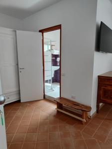 Televízia a/alebo spoločenská miestnosť v ubytovaní Agriturismo Scialà + 11 fotografií