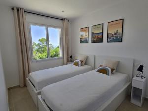 Postel nebo postele na pokoji v ubytování Villa vue mer neuve 3754 + 15 fotografií