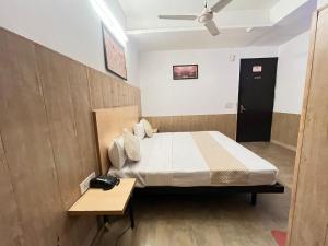 Postel nebo postele na pokoji v ubytování Hotel Vasundhara Grand - Vasundhara