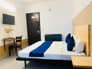 Postel nebo postele na pokoji v ubytování Hotel Vasundhara Grand - Vasundhara