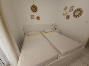 Ein Bett oder Betten in einem Zimmer der Unterkunft Cozy Sun