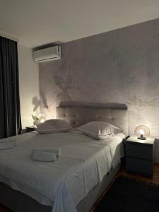 Posteľ alebo postele v izbe v ubytovaní Providenca Apartments