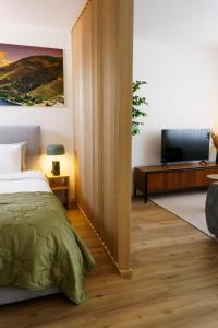 Katil atau katil-katil dalam bilik di Lighthouse by MyMoradia I Vue & Élégance à Porto +47 gambar