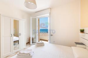 Postel nebo postele na pokoji v ubytování Salentoandmore - Affaccio sul mare