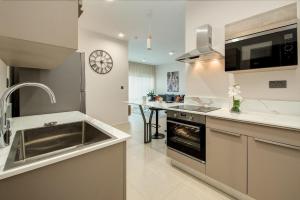 Kuchyň nebo kuchyňský kout v ubytování Minissy luxury Serviced Apartment