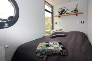 Ein Bett oder Betten in einem Zimmer der Unterkunft Houseboat Leni, Flensburg
