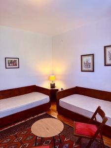 Voodi või voodid majutusasutuse Lemon tree villa toas