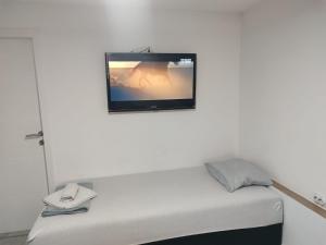 TV a/nebo společenská místnost v ubytování Apartmani Hub