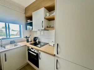 Η κουζίνα ή μικρή κουζίνα στο Azores Pedra Apartaments H