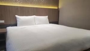 Letto o letti in una camera di KDM Hotel