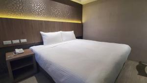 Letto o letti in una camera di KDM Hotel