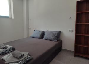 Postel nebo postele na pokoji v ubytování Apartmani Hub