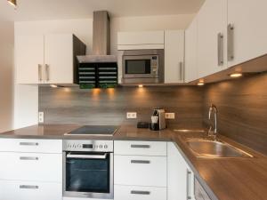 Η κουζίνα ή μικρή κουζίνα στο Property in Kirchbichl